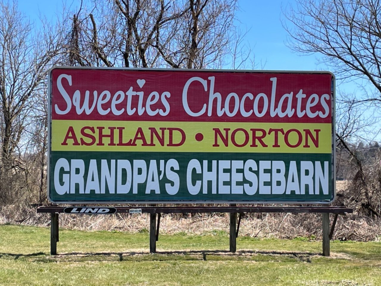 Grandapa's Cheesebarn billboard, Sweeties Chocolates billboard