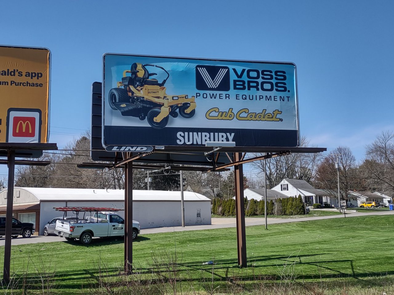Voss Brothers billboard, Cub Cadet Billboard, lawn mower billboard
