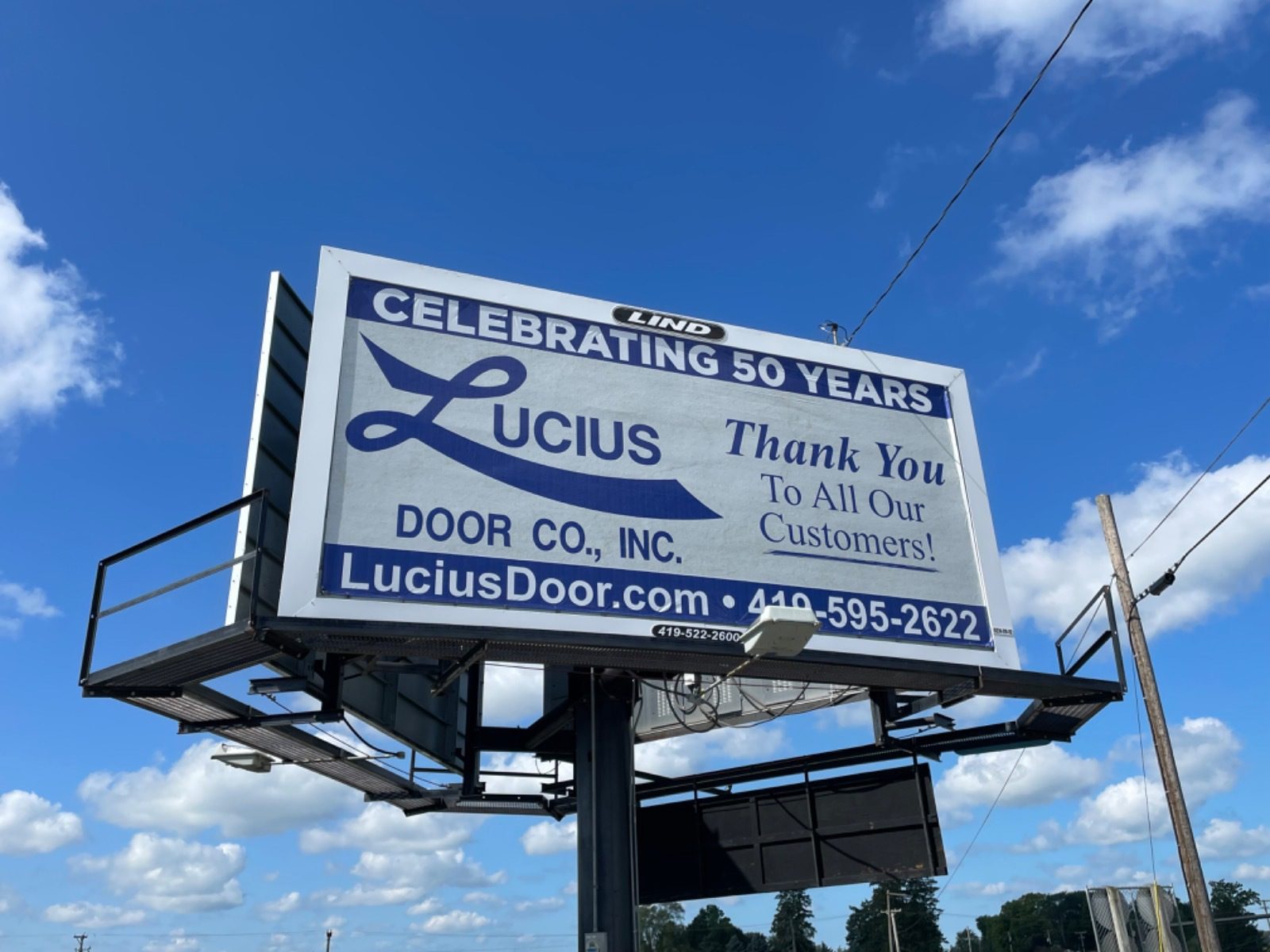 Lucius Door billboard, garage door billboards