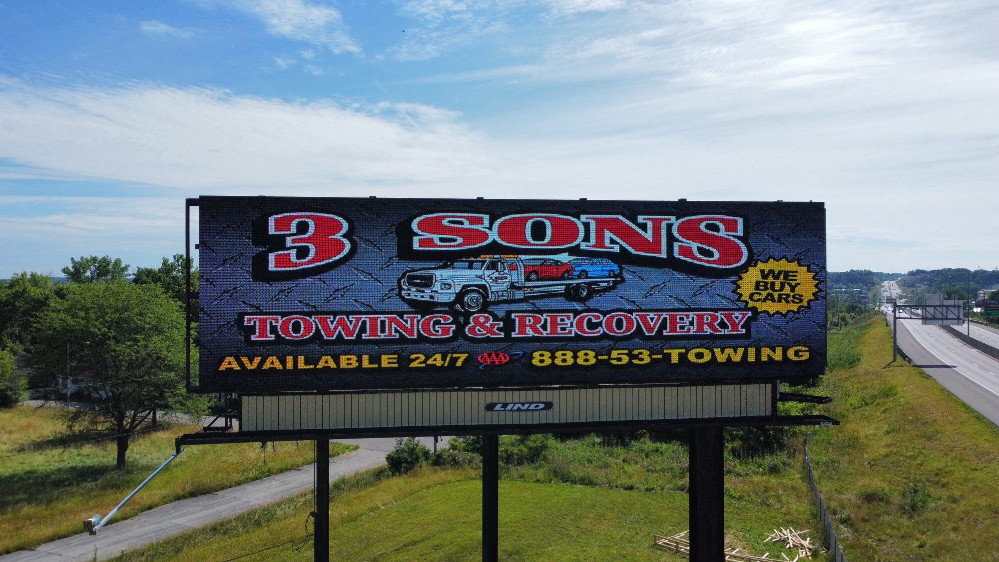 Three Sons billboard, towing billboard